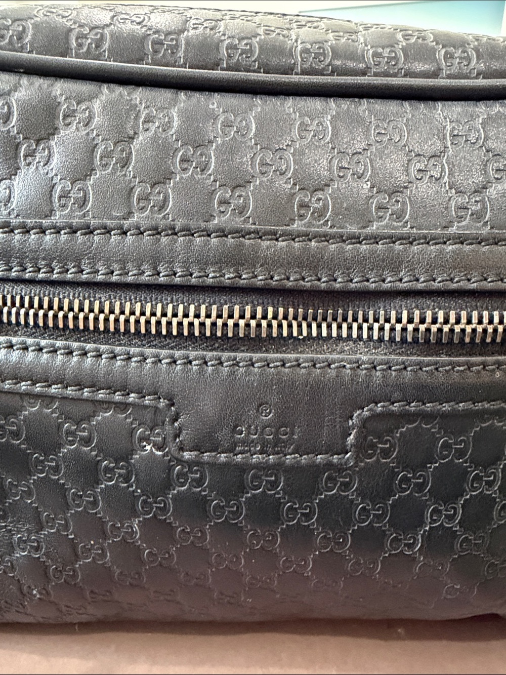 Authentic Gucci Black GG-Embossed Leather Toiletry Pouch with Silver-Tone Zip - Picture 10 of 10